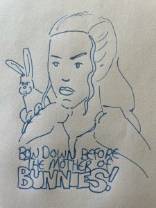 A picture of Khaleesi with a bunny on her shoulder.